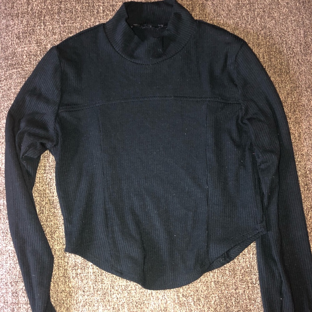 Cropped turtle neck, tag cut off.